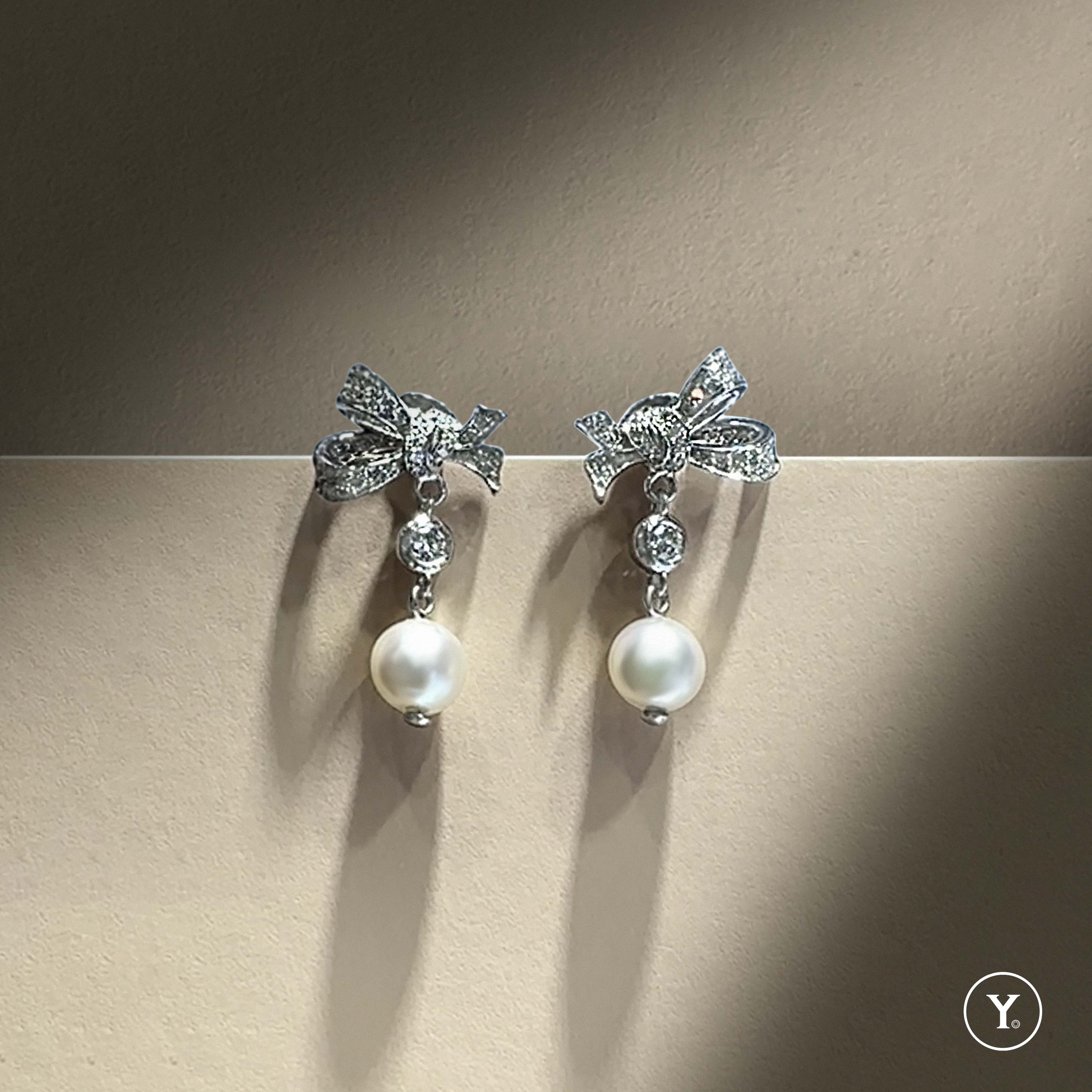 Bow Grace Pearl Earrings - A timeless bow designed earrings in 14K white gold with South Sea Pearl